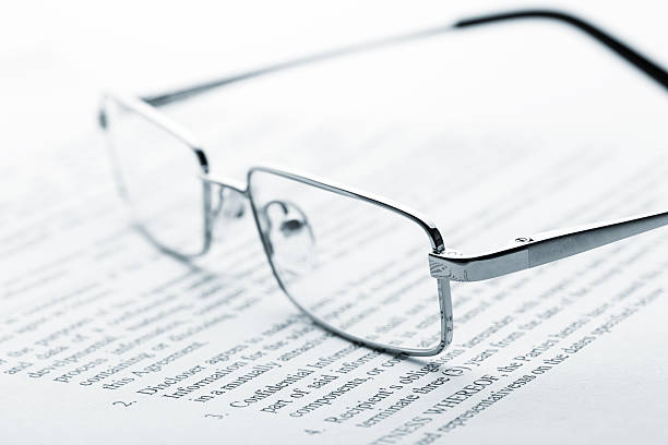 istock Glasses on newspaper. Toned 536687211