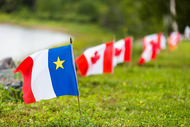 A row of Acadian and Canadian flags, as seen in the Acadian region of New Brunswick, Canada.