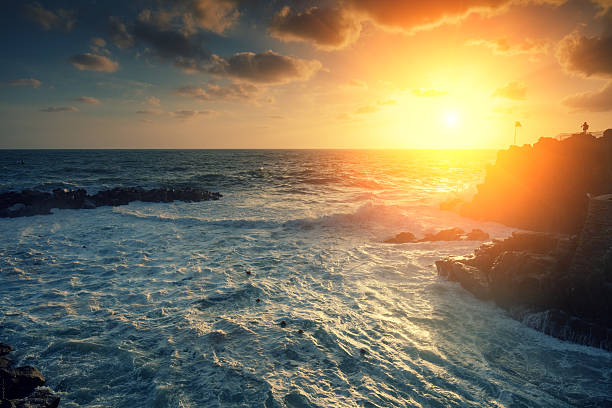 istock Sunset over rocky sea coast 536688282