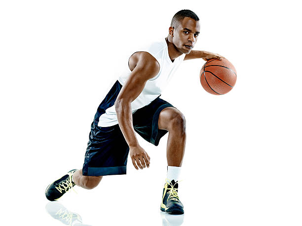basketball player  man Isolated one basketball player man Isolated on white background basketball player photos stock pictures, royalty-free photos & images