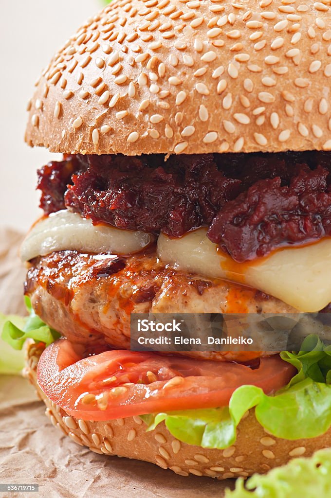 American burger with chicken and bacon, homemade barbecue sauce 2015 Stock Photo