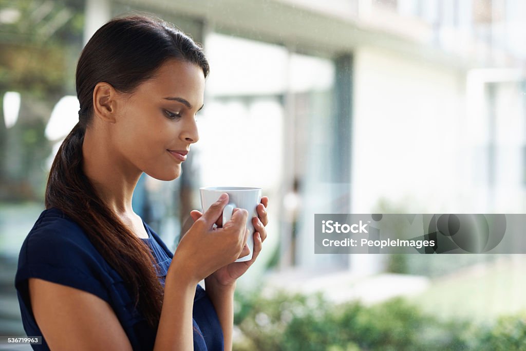 Enjoy a cup of inspiration Cropped shot of an attractive young woman enjoying a freshly brewed cup of coffeehttp://195.154.178.81/DATA/istock_collage/0/shoots/783396.jpg 2015 Stock Photo