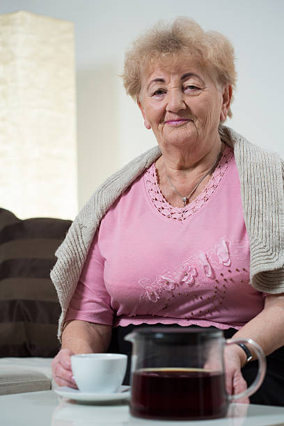 istock Elderly woman drinking coffee 536721457