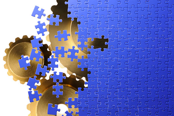 blue puzzle avec engrenages en métal avec espace pour copie - puzzle part of gold jigsaw piece photos et images de collection