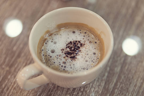 istock cup of hot latte coffee, vintage tone 536728418