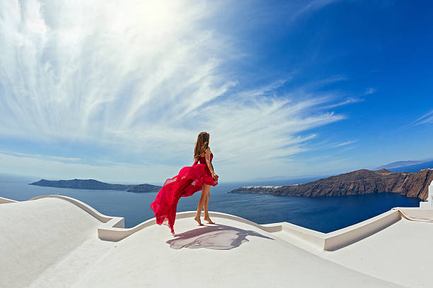 istock Woman in red dress 536734040