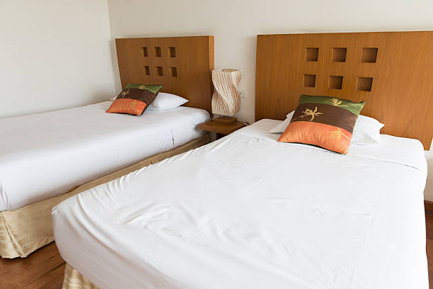 istock pillow and bed in hotel room 536740462