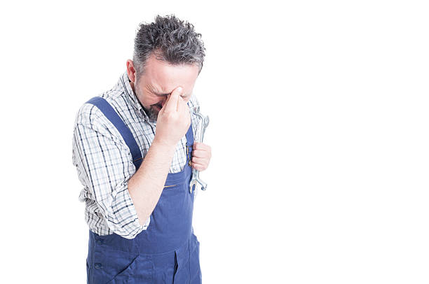 istock Man holding head with hand looking worried and anxious 536747246