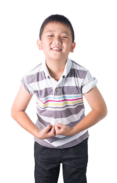 istock Strong Asian boy  showing off his biceps flexing muscles arm 536749145