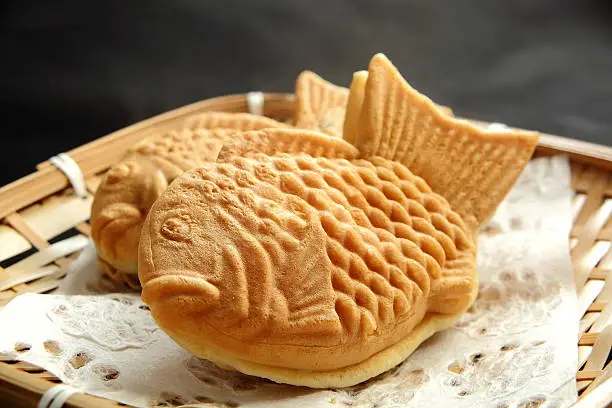 Taiyaki, which is a popular Japanese confection of sweet bean paste in fish-shaped waffles.