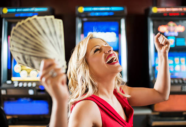 Woman Slot Machine Stock Photos, Pictures & Royalty-Free Images - iStock