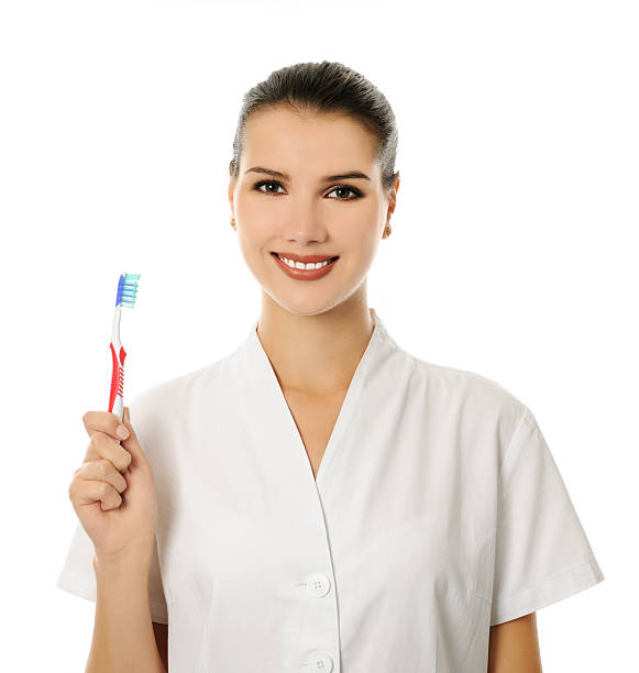 istock doctor woman with toothbrush 536752541