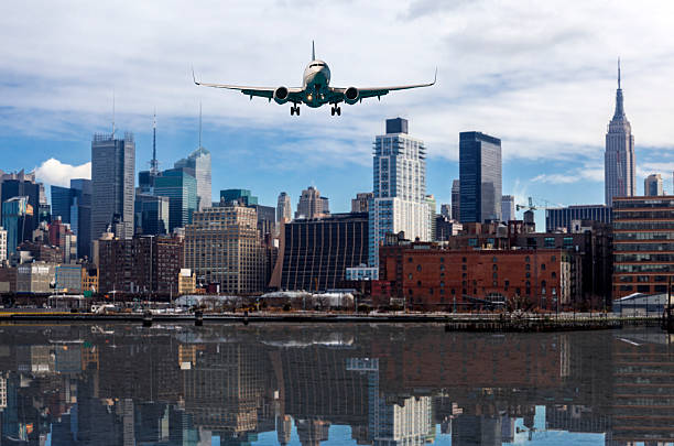 istock Airplane fly above the city 536752951