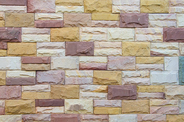 stone brick wall, abstract background stone brick wall, abstract background stone wall stone wall crag stock pictures, royalty-free photos & images