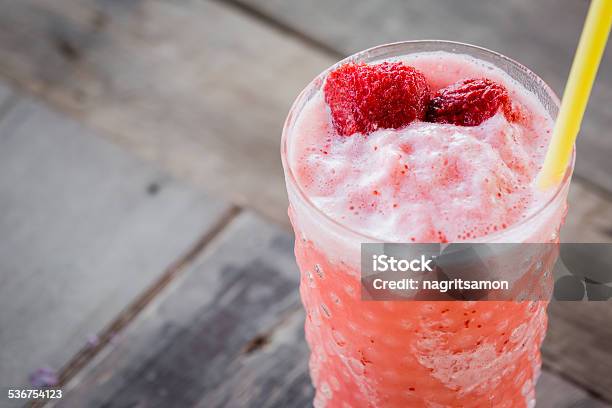 Strawberry Smoothie On Wood Table Stock Photo - Download Image Now - 2015, Banana, Cocktail