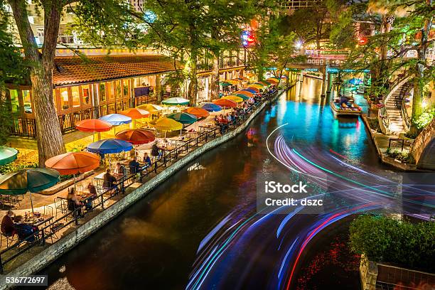 San Antonio Riverwalk Texas Scenic River Canal Tourism Umbrellas Night Stock Photo - Download Image Now