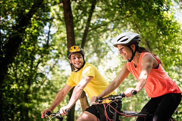 istock Young couple riding bicycles 536774625