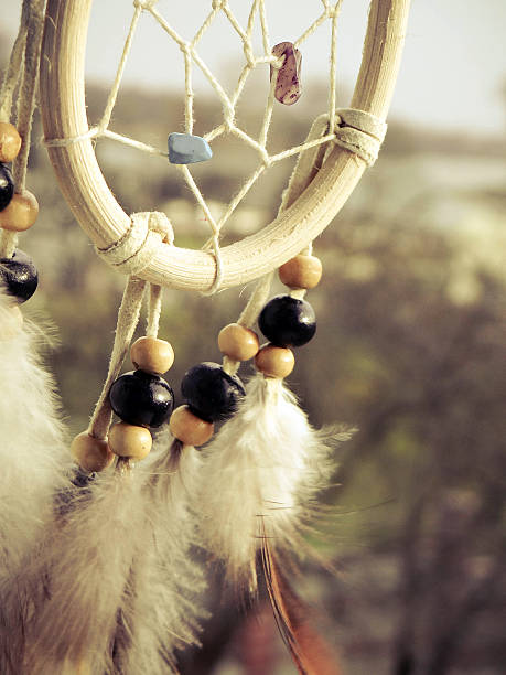 istock Wooden Dreamcatcher with feathers and beads 536775545