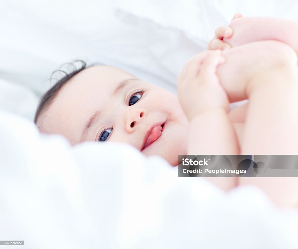 She's a cute baby Portrait of a cute baby girl lying downhttp://195.154.178.81/DATA/istock_collage/0/shoots/781120.jpg 2015 Stock Photo