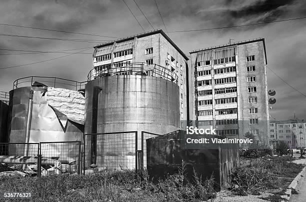 Old Houses And Tanks Stock Photo - Download Image Now - 2015, Abandoned, Apartment