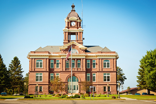 Subject: A small town city hall in the United States, where local government take place.