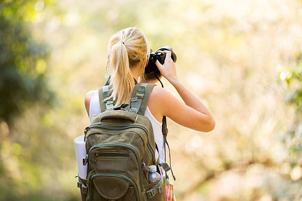 istock young female photographer in mountain 536779405