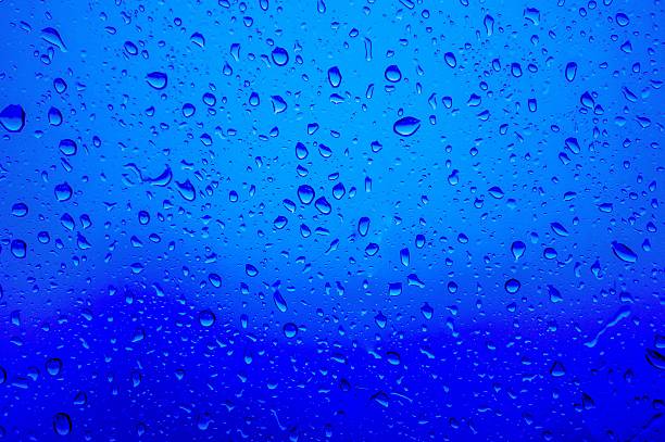 istock Blurred abstract background view of Rain drops on window surface 536800084