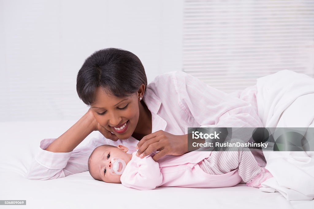 Mother with a baby. Portrait of a mother with her baby. 2015 Stock Photo