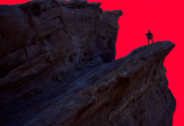 istock Lone figure on high rocks California 536809612