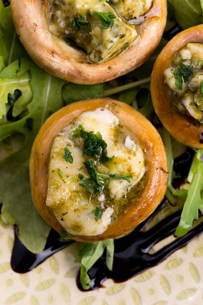 istock Delicious stuffed mushrooms with cheese and pesto 536810911