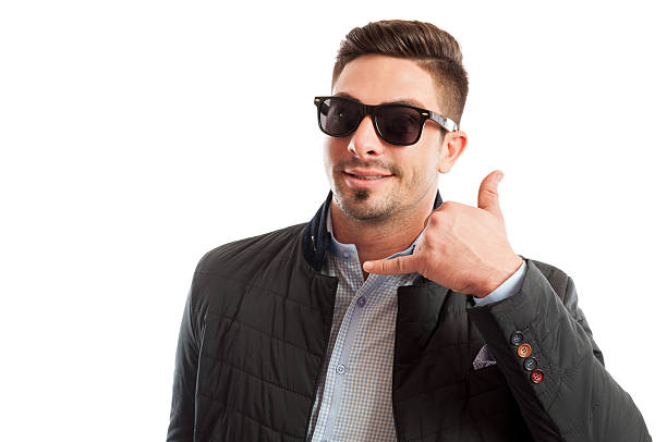 istock Handsome and funky sales man making call me gesture 536811003