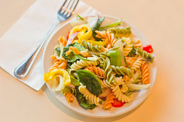 Delightful and vibrant tricolor pasta salad with healthy vegetables