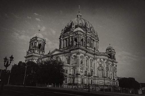 Lateral view of Berlin Cathedral. View from Andren river Spree. Black / White Architectural Photography in vintage style from Berlin.
