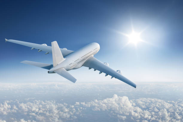 istock Huge plane flying towards the sun 536812181