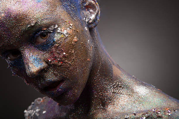 istock Portrait of woman with unusual solver paint make-up 536812975