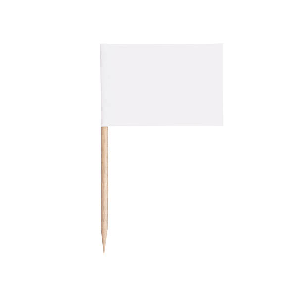 paper white flag.Isolated on white background white paper flag. Ready for a Message. Isolated on white background.With clipping path cocktail stick stock pictures, royalty-free photos & images