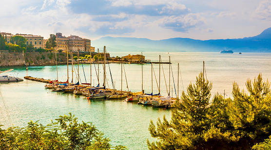 Marina with small moored yachts and Old Town. View from Old Fortress. Kerkira (Corfu town). Greek islands.