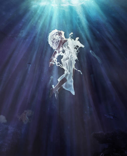 Swim towards the light... Full-length shot of a young woman submerged in waterhttp://195.154.178.81/DATA/i_collage/pi/shoots/781176.jpg goddess of ocean stock pictures, royalty-free photos & images