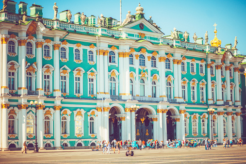 St. Petersburg, Russia - August 8, 2014: Tourists walking on the Palace square near Hermitage museum