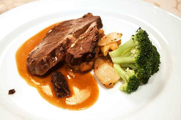 istock Grilled steak with garnish of cauliflower 536815771