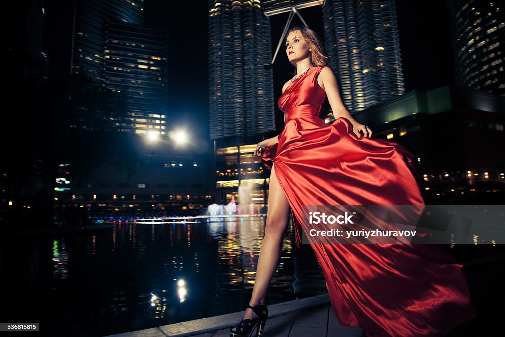 Fashion Lady In Red Dress And City Lights Luxury Stock Photo