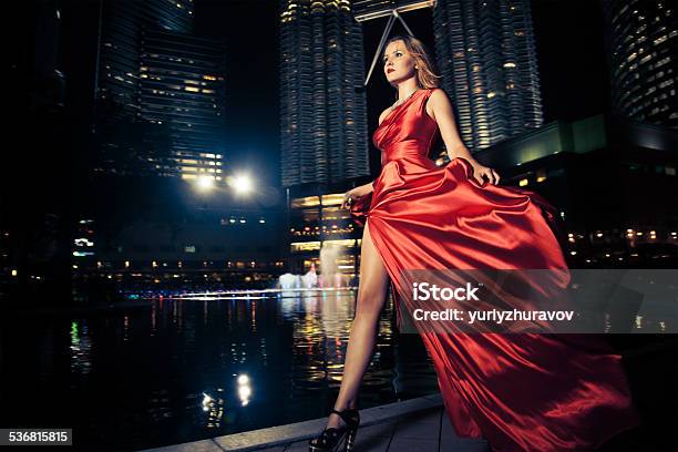 Fashion Lady In Red Dress And City Lights Stock Photo - Download Image Now - Luxury, Women, Fashion Model