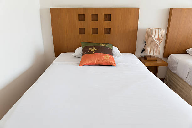 istock pillow and bed in hotel room 536816694