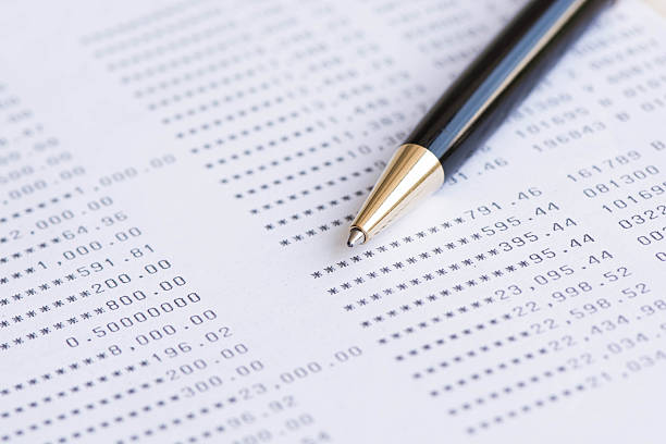 istock pen on Bank statement close up 536826186