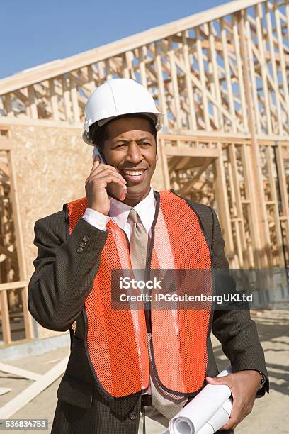 Architect At Construction Site Stock Photo - Download Image Now - 2015, 35-39 Years, Adult
