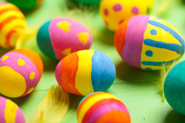 istock Colorful easter eggs on green wooden table 536838295