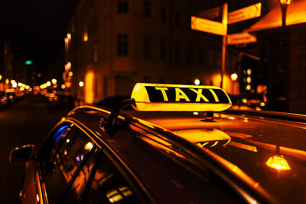 istock taxi sign at night 536843904