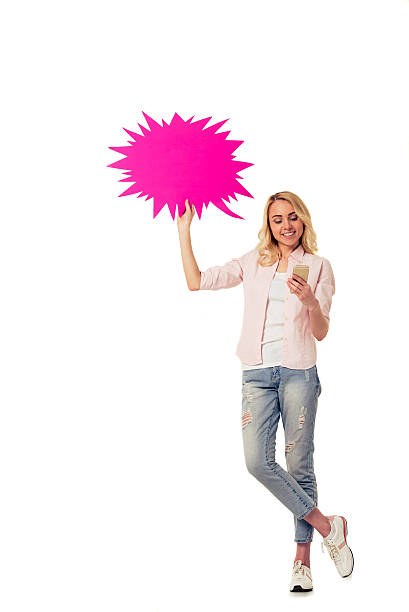 istock Girl with speech bubble and gadget 536844094