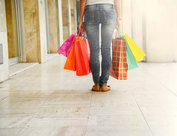 istock Young woman after shopping 536847924
