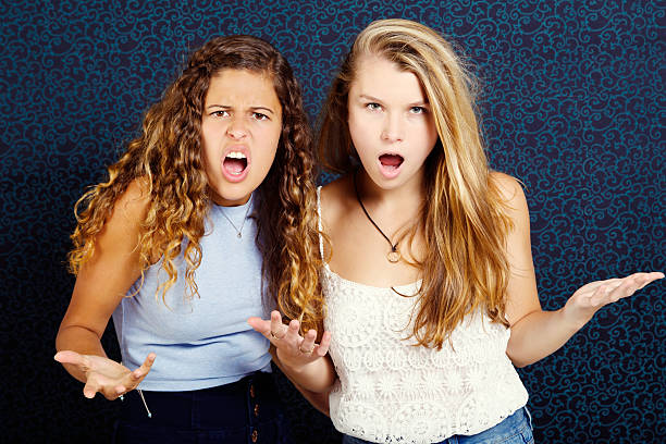 istock WTF? Two upset young beauties gesture angrily, grimacing in outrage 536855191